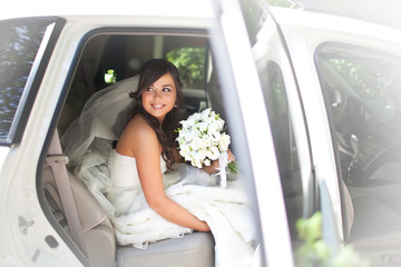 Look from outside at charming bride