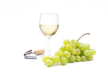 White wine glass with grapes