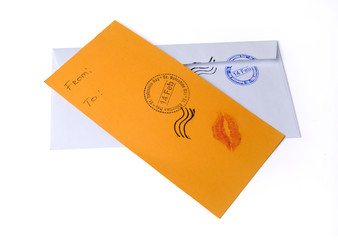 composition on the theme of Valentine's Day - blank envelope and a card with the imprint of a kiss