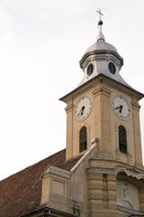 Fototapeta na wymiar Church Tower showing Clock and Jesus 
