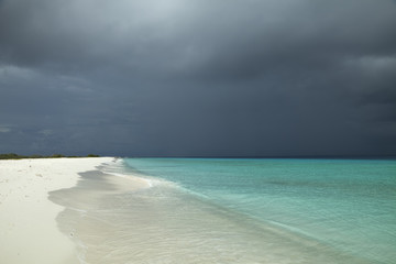 Tropical beach and strom clouds on Little Curaçao, Netherlands