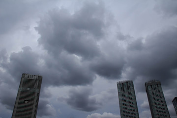 Fototapeta na wymiar Skyscrapers towering in the sky of gray