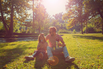 Father and daughter enjoying in the park.