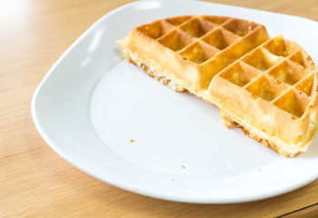 homemade waffle in white dish