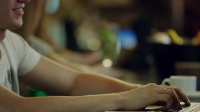 male student using laptop