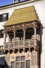 INNSBRUCK, AUSTRIA – NOVEMBER 1st 2015: The Golden Roof, completed in 1500, ornamented with 2,738 fire-gilded copper tiles for Emperor Maximilian I to mark his wedding to Bianca Sforza