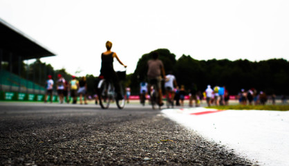 Obraz premium Formula Racing Track With People