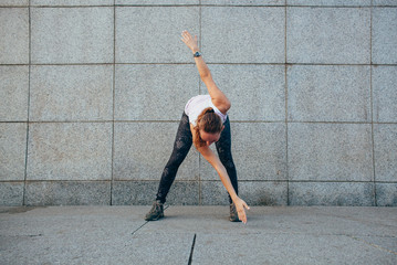sporty woman doing stretching exercises