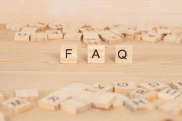 FAQ word written on wood cube