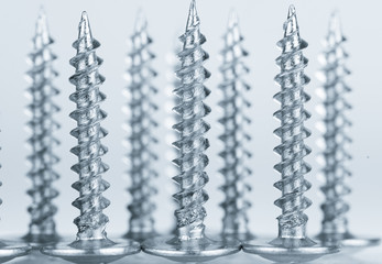 Line of silver screws toned grey