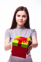 young girl giving a present. isolated over white background
