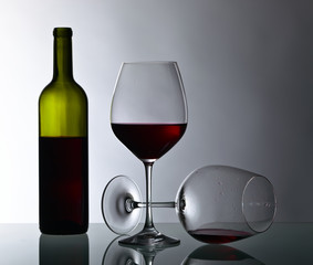 bottle and glass of red wine