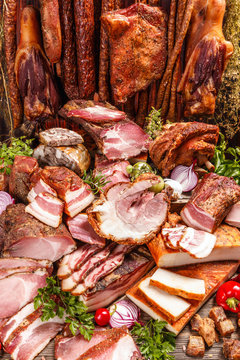 Still life of various smoked pork meat