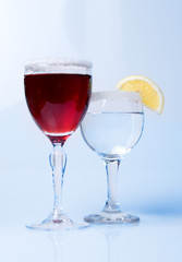 Wine glass close-up, decoration on the edge of a white crumb