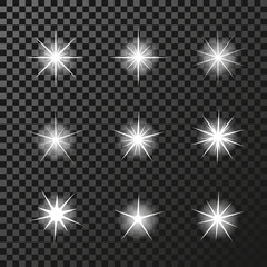 Vector set of sparkles white symbols on the dark background - star glitter, transparency stellar flare. Shining reflections.