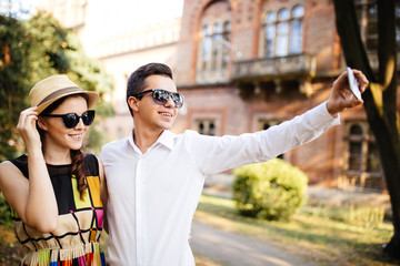 Fototapeta premium Young Couple Taking Selfie