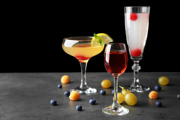 Delicious cocktail on gray table