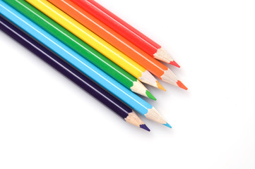 colorful pencils on a white background close-up