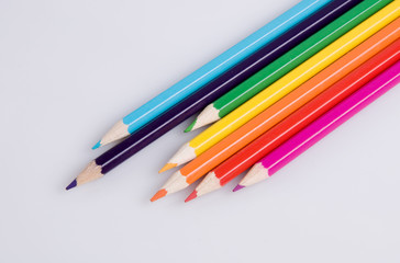Fototapeta premium colorful pencils on a white background close-up
