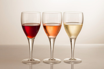 Three glass of red, rose and white wine