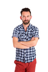 Trendy mature man standing with arms crossed over white background