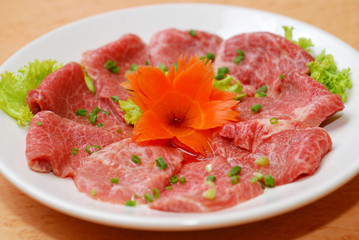 Premium raw japanese beef sliced on plate