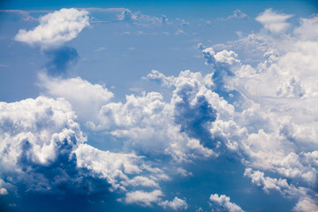 Beautiful, dramatic clouds and sky viewed from the plane. High resolution and quality