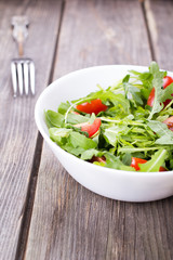 Salad arugula and cherry tomato