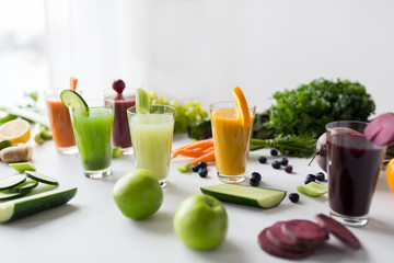 glasses with different fruit or vegetable juices