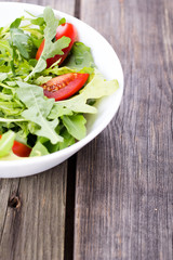 Salad arugula and cherry tomato