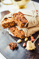 Pumpkin granola bars with peanut butter and seeds,close up