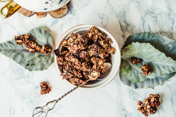 Chocolate homemade granola with peanut butter and pear