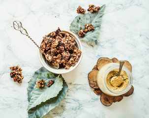 Chocolate homemade granola with peanut butter and pear