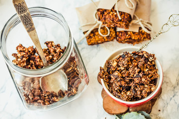Chocolate homemade granola with peanut butter and pear,close up