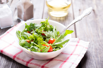 Salad arugula and cherry tomato