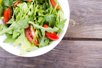 Salad arugula and cherry tomato