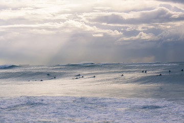 Fototapeta na wymiar Surfers Storm Riders