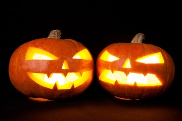 Halloween pumpkins smile and scary eyes for party night