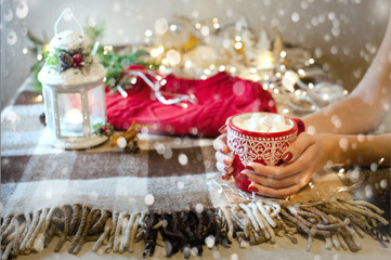 cup of hot cocoa with marshmallow with Christmas decorations at home, Christmas tree on background,...