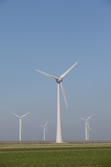 Fototapeta premium Windturbines producing alternative energy