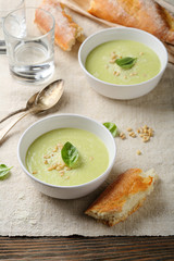 Cream soup with cheese in two bowls
