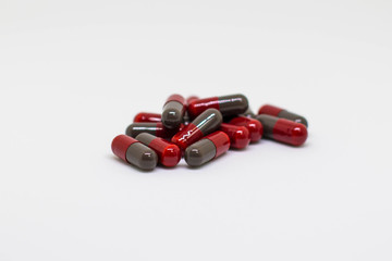 Red capsule drugs pills group