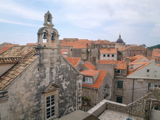 Fototapeta na wymiar dubrovnik, Croatia, 06/06/2016 Dubrovnik old town croatia, roof top view of churches and houses
