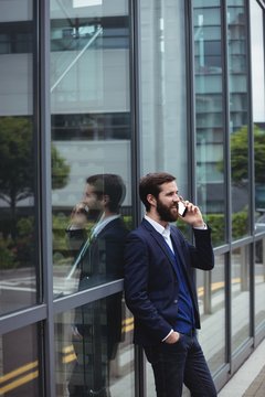 Businessman talking on mobile phone