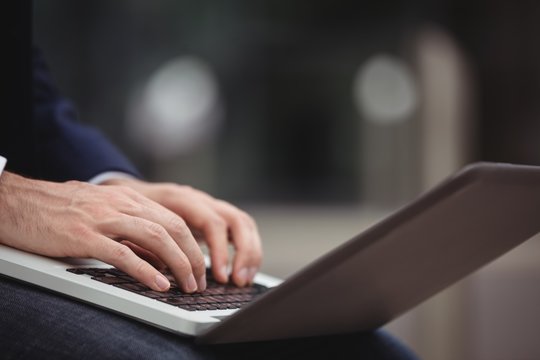 Businessman using laptop