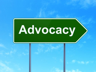 Law concept: Advocacy on road sign background