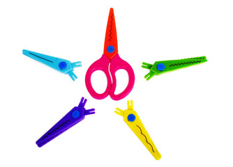 Fancy colourful scissors on the white background