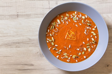 Pumpkin soup with seeds, space for text