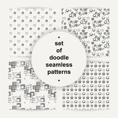 Set of hand drawn doodle seamless patterns.