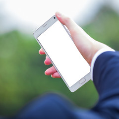 Close-up hand of asian man using smart phone
